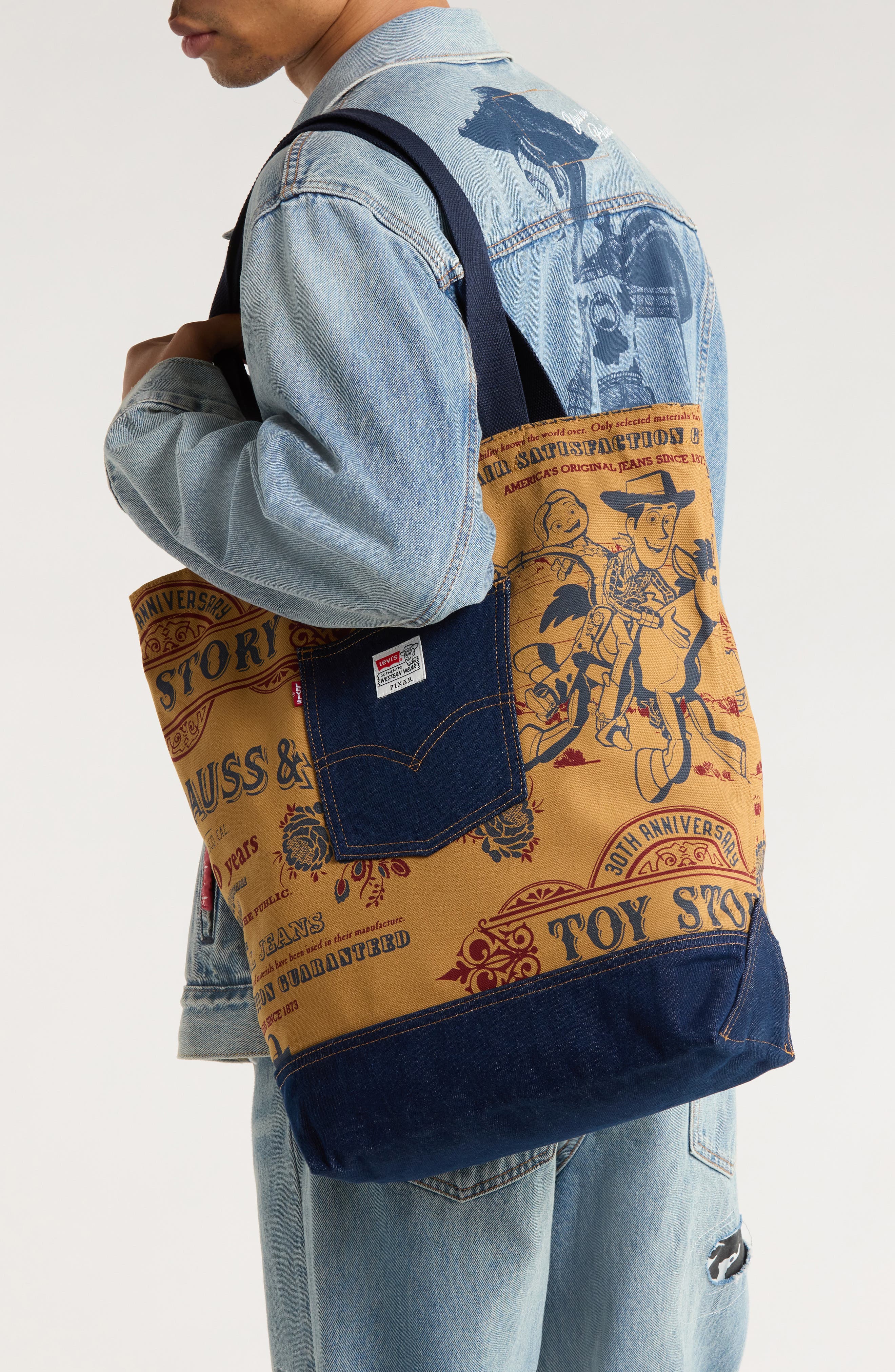 x Disney Pixar® Toy Story Print Canvas & Denim Tote (Men) | Nordstrom