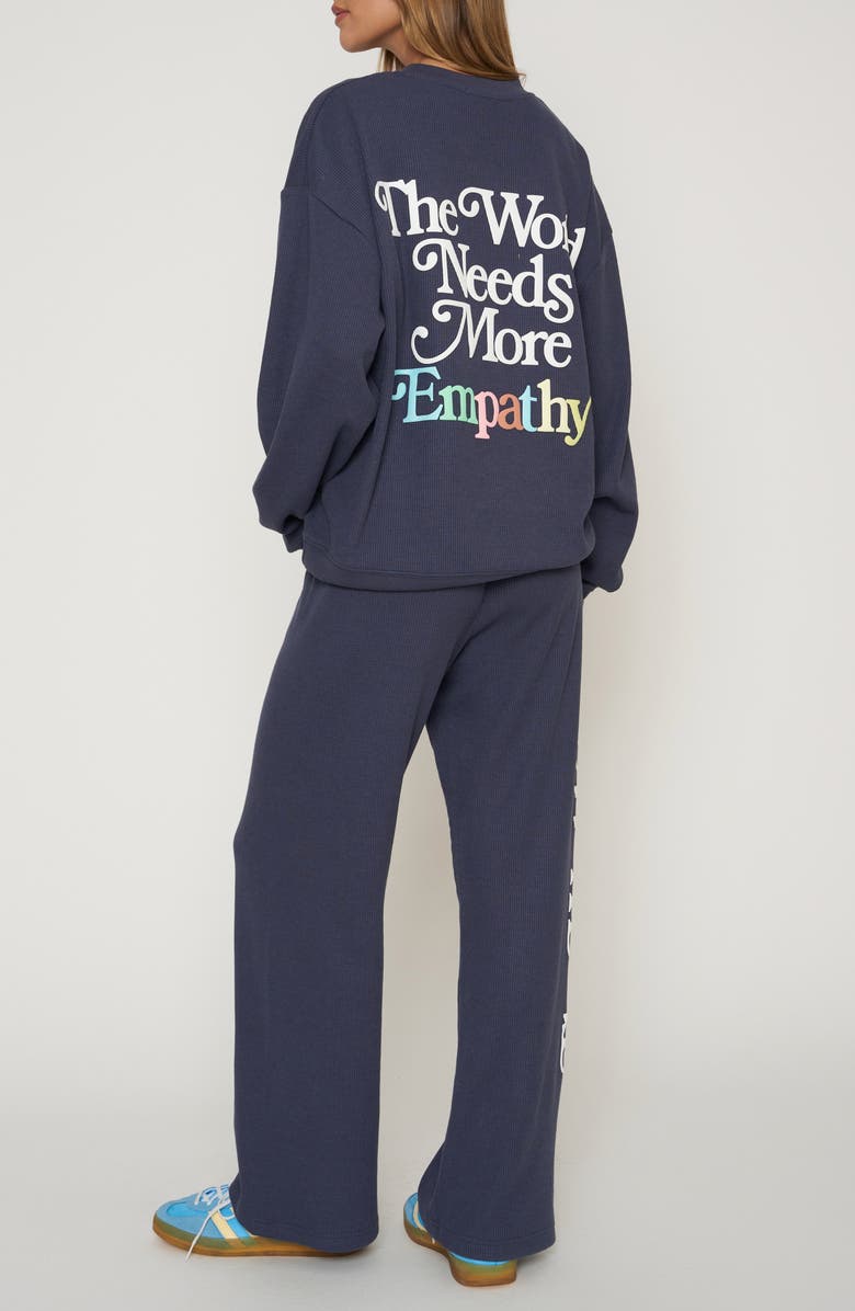 THE MAYFAIR GROUP World Needs Empathy Waffle Knit Fleece Graphic Sweatshirt, Alternate, color, Navy Blue