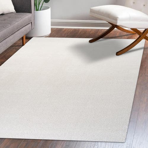 Shop Jonathan Y Haze Solid Low-pile Area Rug In Beige/ecru