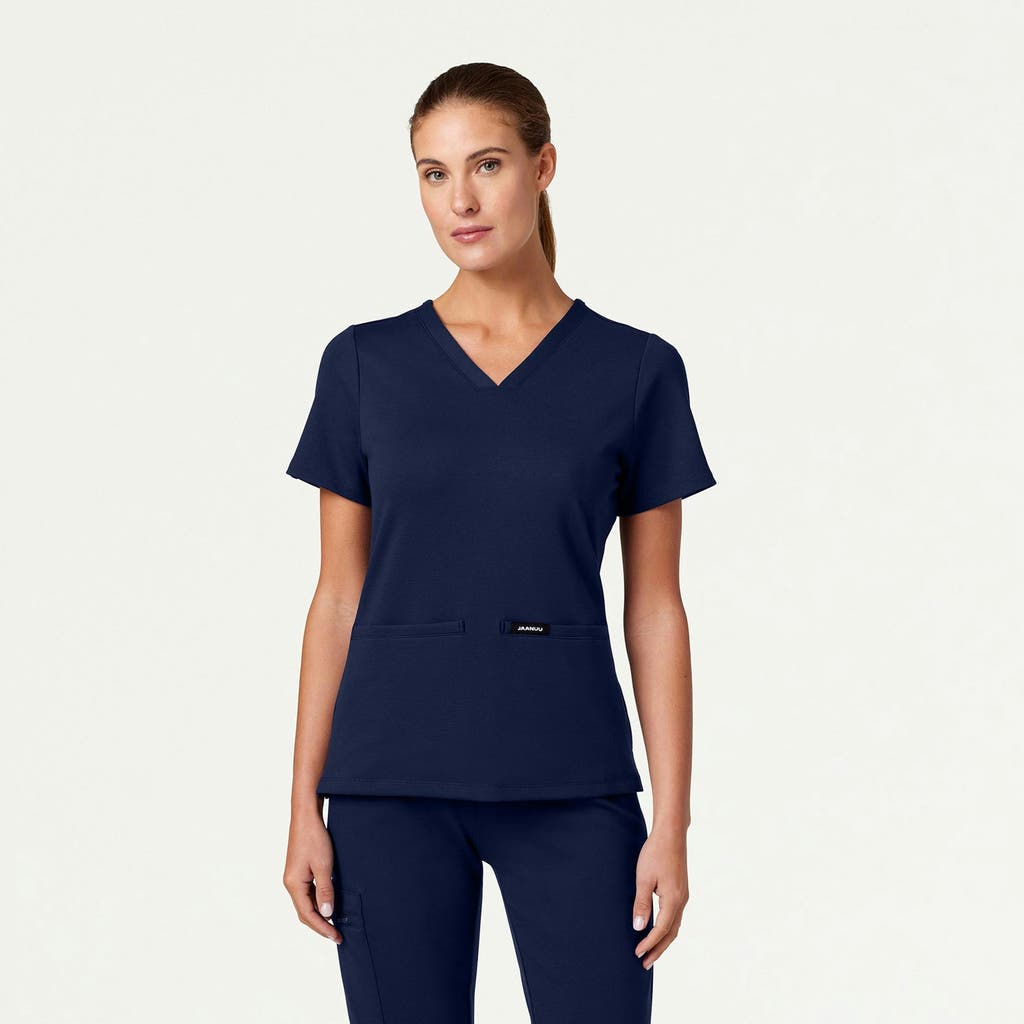 Jaanuu 2-pocket Slim Knit V-neck Scrub Top In Blue