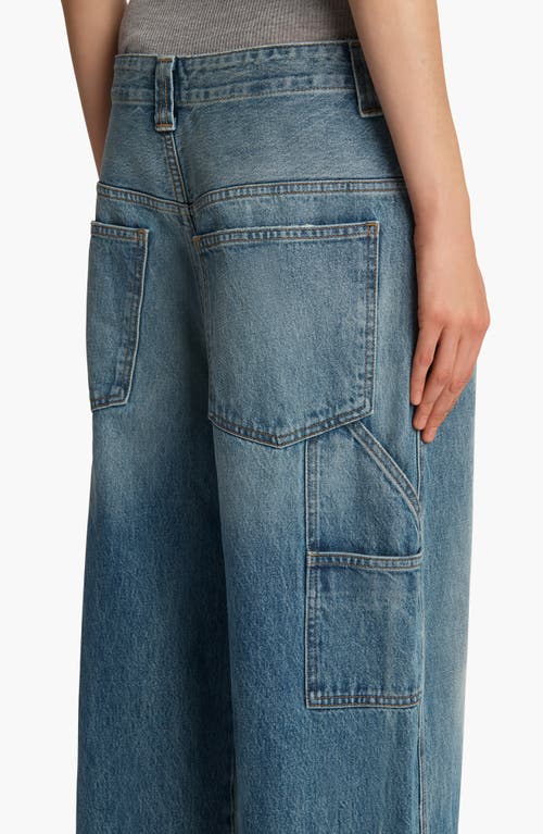 Shop Khaite Sowen Distressed Wide Leg Carpenter Jeans In Heath