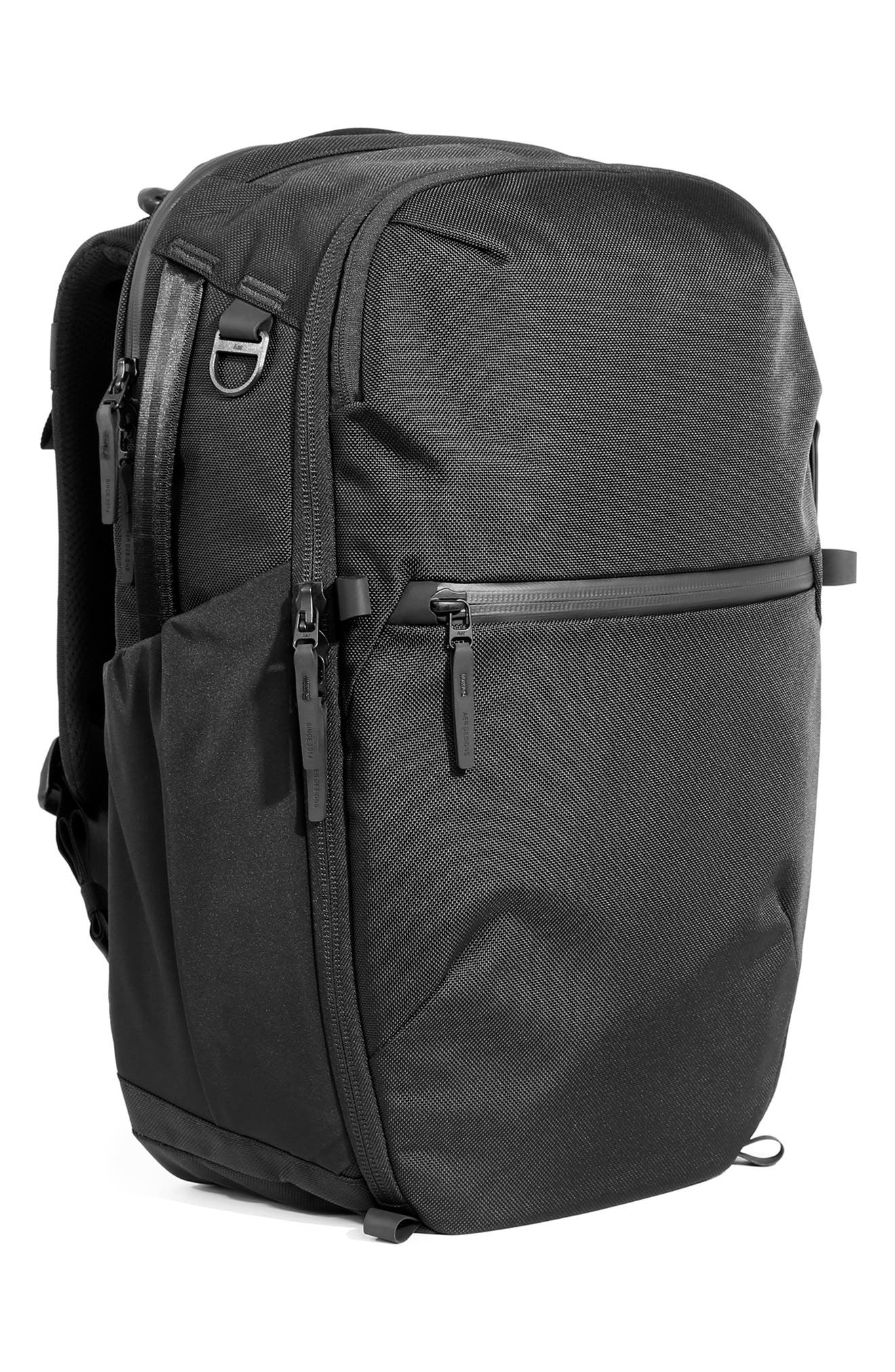 35l medium travel backpack made by design Nomatic McKinnon Camera Pack built to last Laptop/tablet pocket Expanded by 5 litres for additional storage space Hidden compartment for passport/travel wallet Hidden AirTag compartment for secure tracking The Transit Travel Backpack is compatible with a variety of WANDRD accessories so you can customise it to your individual needs Open Story Travel Backpack 35L,