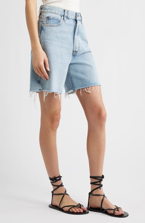 Shop Frame The Timeless Raw Hem Denim Bermuda Shorts In Tricky