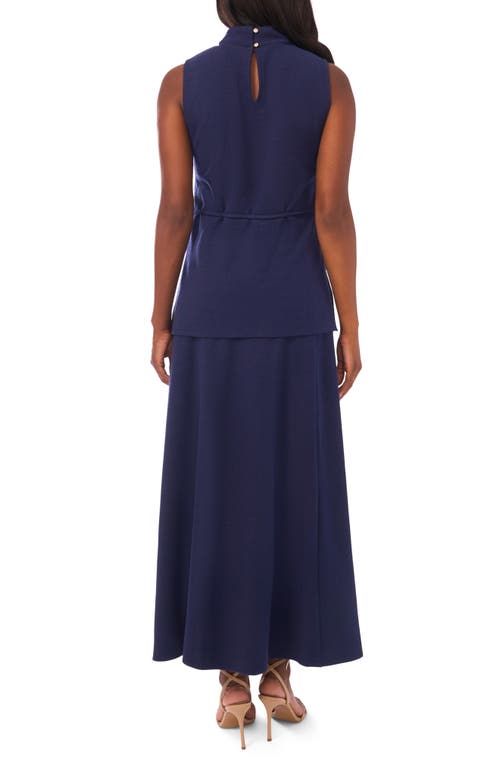 Vince Camuto Sleeveless Belted Mock Neck Top In Blue