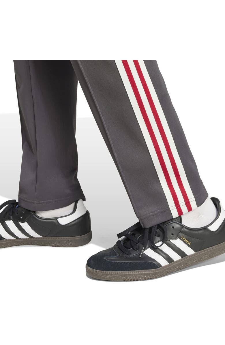 adidas Originals Men's adidas Originals Black Manchester United adicolor Track Pants, Alternate, color, Black