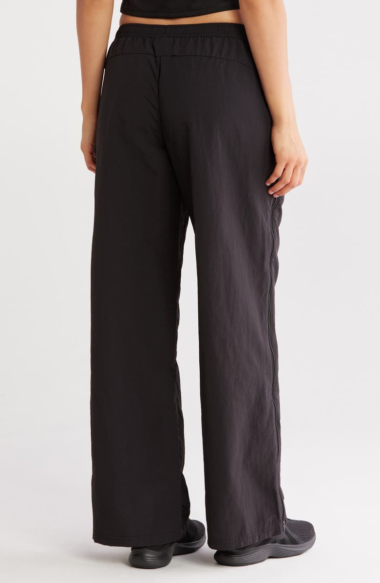 PUMA Dare To Relaxed Woven Zip-Off Pants, Alternate, color,