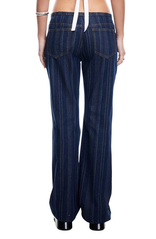 Shop Lioness Charismatic Dipped Low Rise Flare Jeans In Dark Denim Stripe