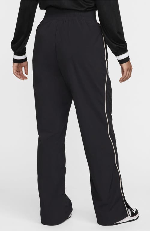Nike Asymmetric Waist Water Repellent Pants In Animal Print