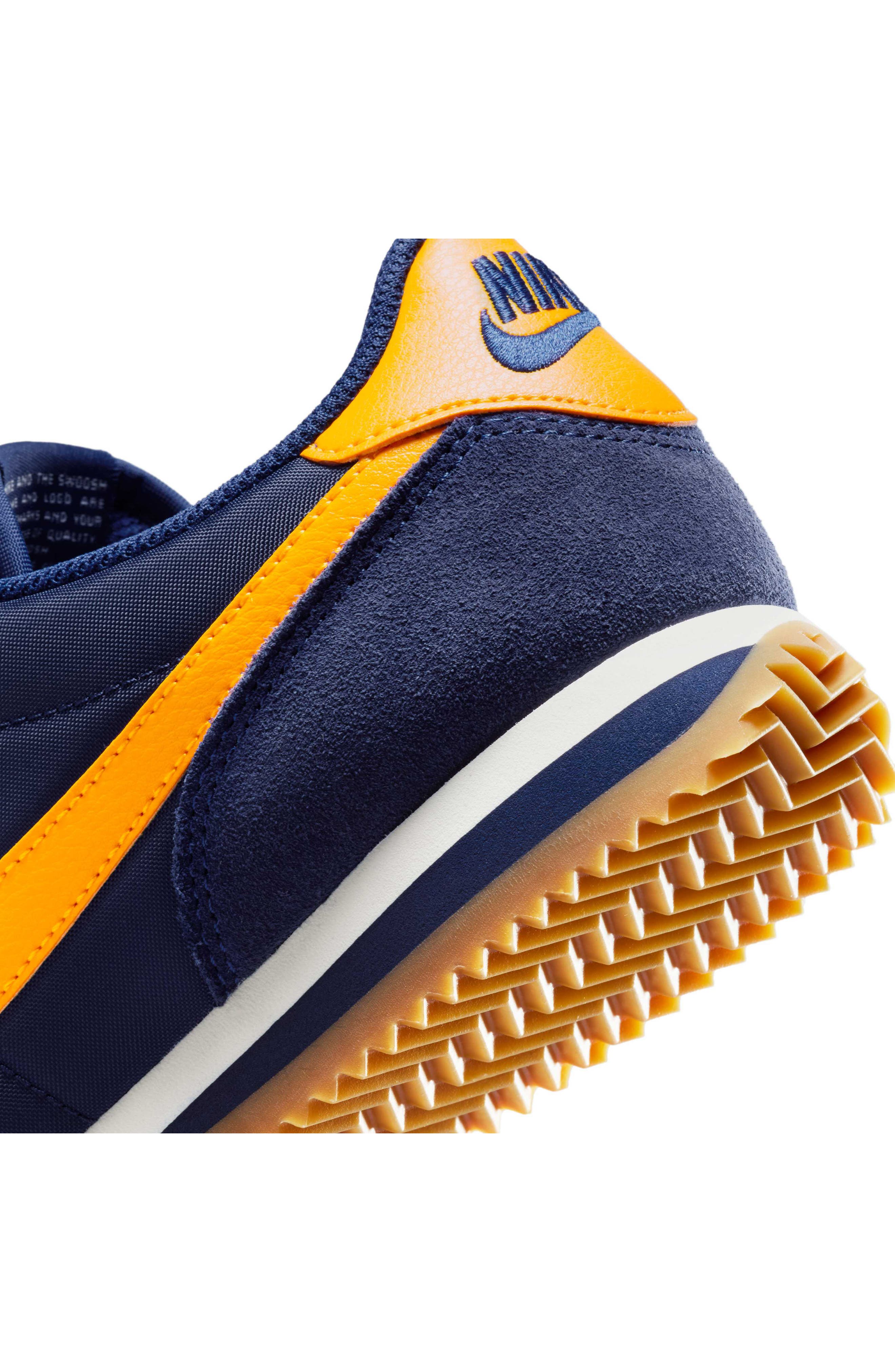 blue and gold nike cortez