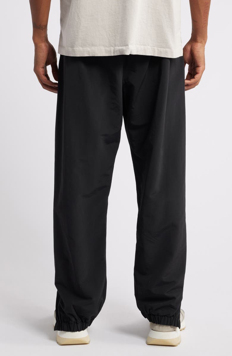 Fear of God Essentials Gender Inclusive Track Pants, Alternate, color, 