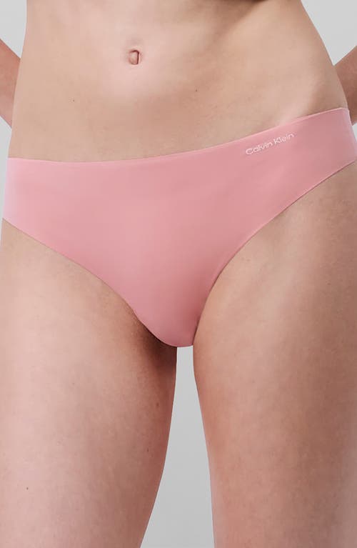 Shop Calvin Klein Invisibles 3-pack Thongs In Wak Shark/wind