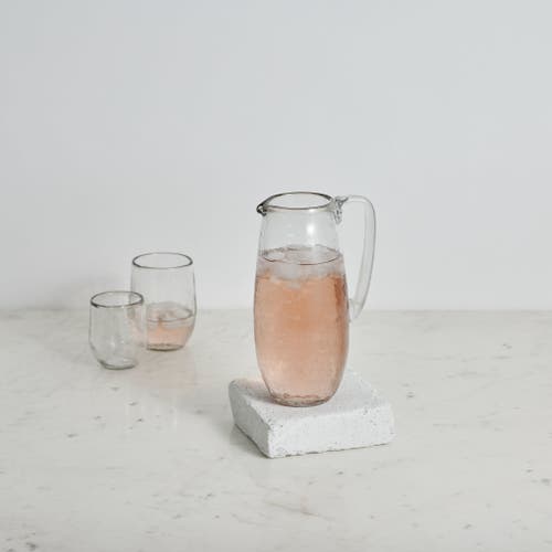 The Collective Home Pebbled Glass Pitcher In Transparent