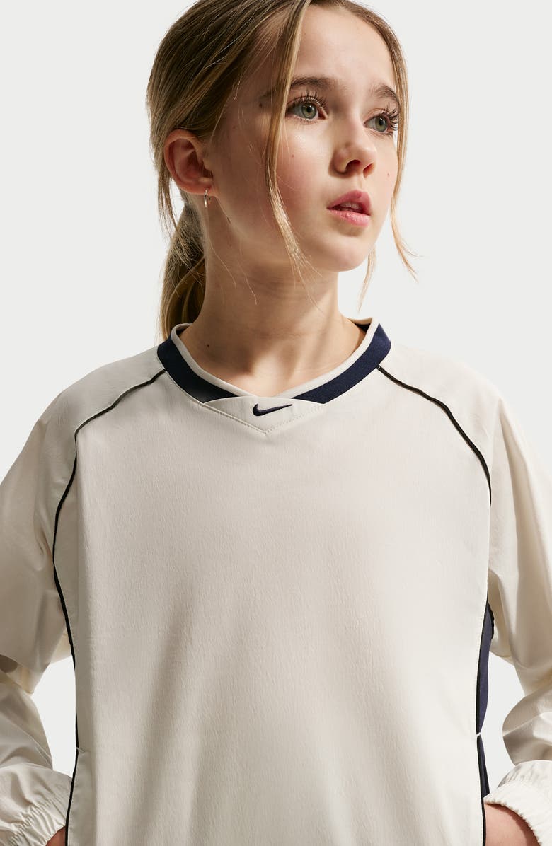 Nike Kids' Woven Long Sleeve V-Neck T-Shirt, Alternate, color, Soft Pearl/ Navy/ Black