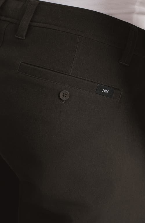 Rhone Nomad Slim Fit Tech Water Repellent Chinos In Green