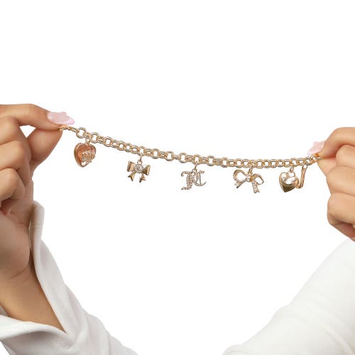 Juicy Couture Gold-tone Charm Bracelet With Bow And Pavé Details In Gold
