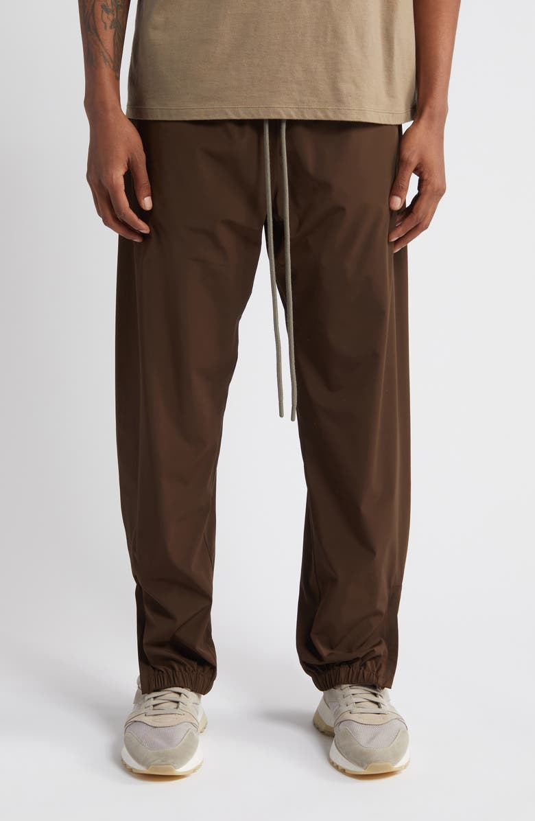 Fear of God Essentials Stretch Nylon Track Pants | Nordstrom