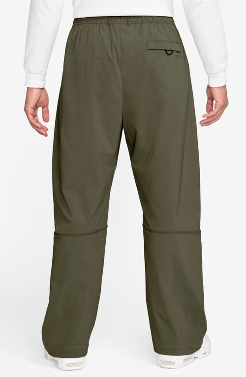 Nike Dri-fit Tech Wide Leg Woven Pants In Green