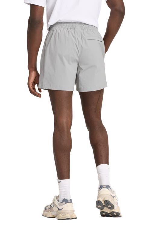 NEW BALANCE NEW BALANCE ATHLETICS WOVEN STRETCH NYLON SHORTS