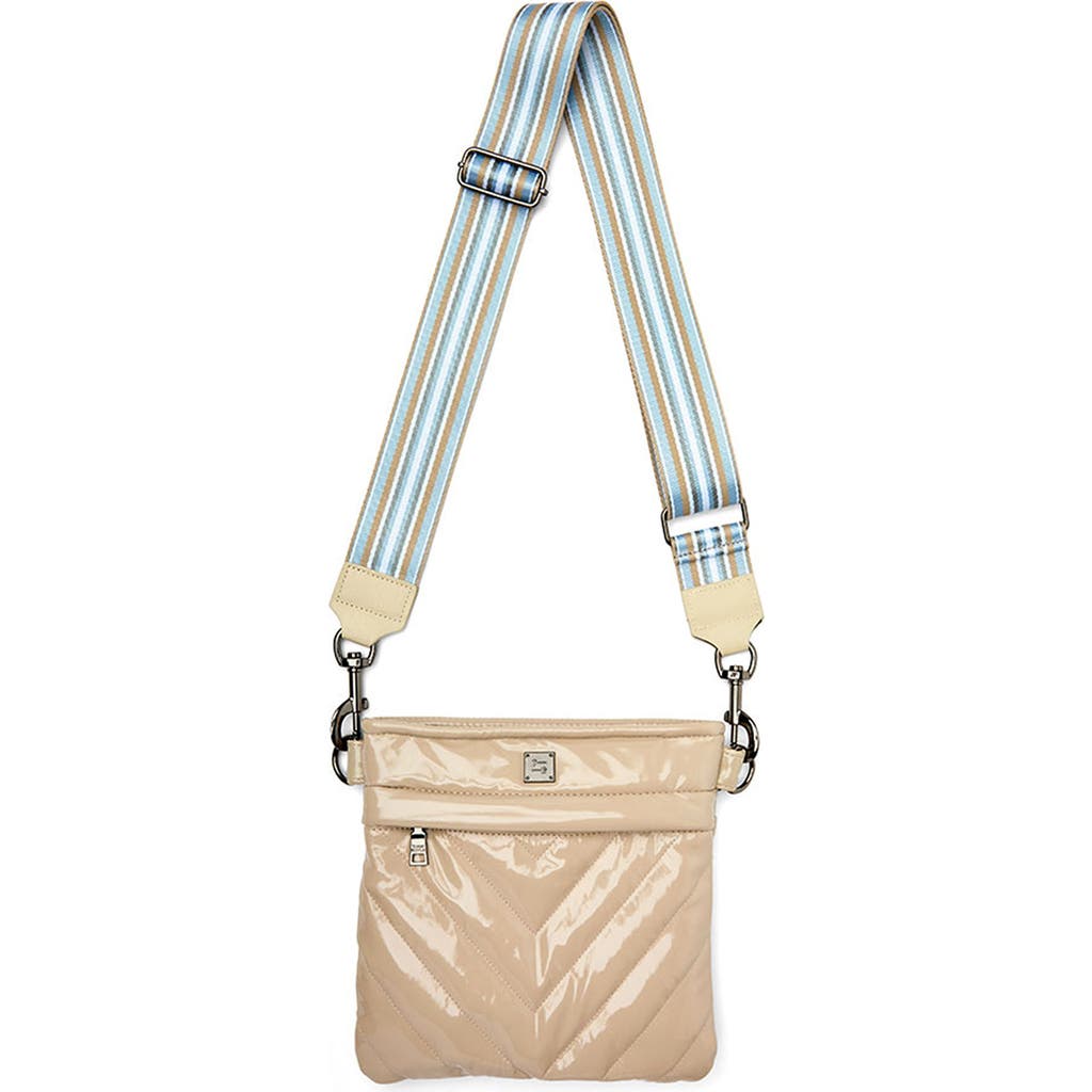 Think Royln Sidewalk Crossbody Bag In Blonde Patent