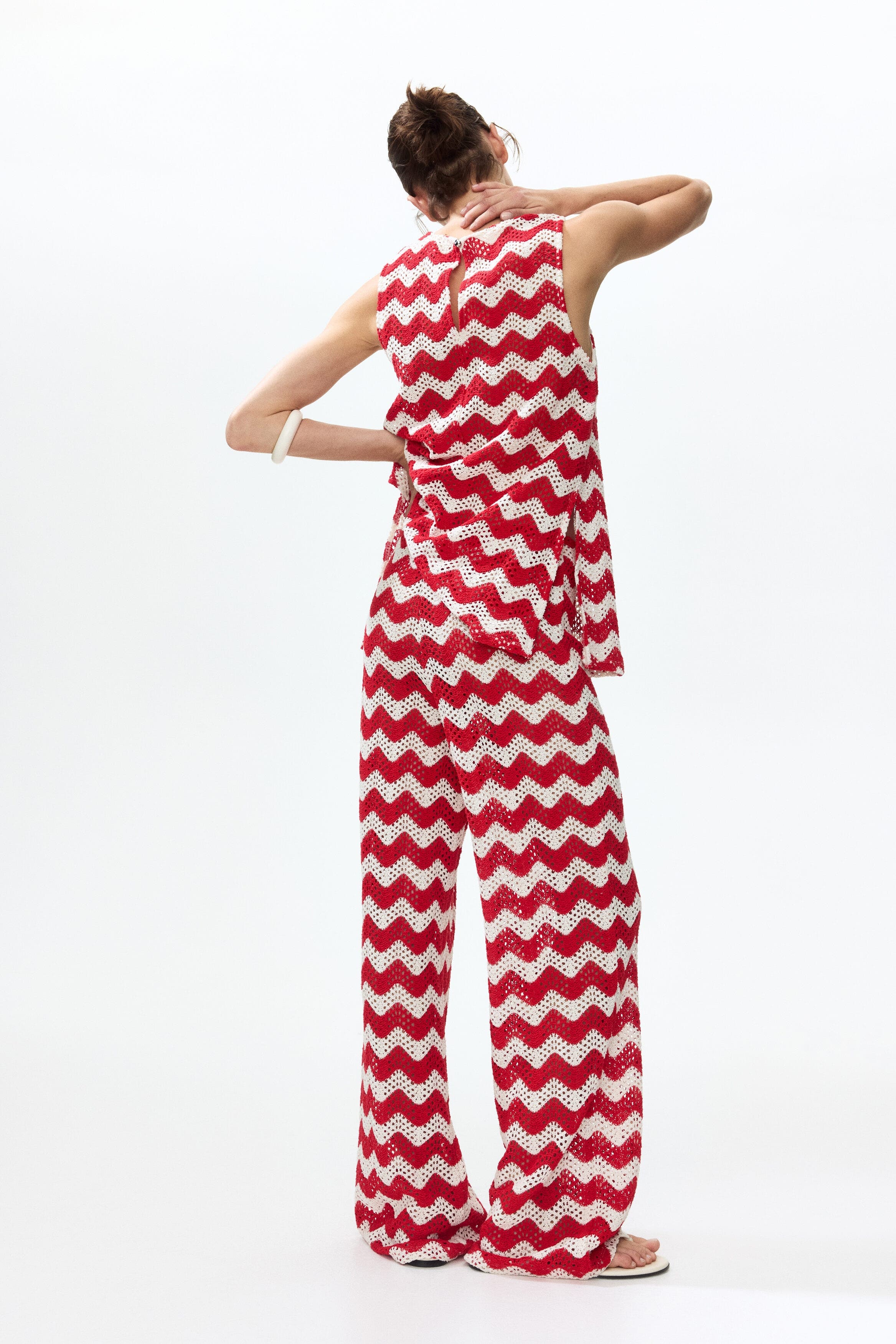 Crochet-look jacquard jersey pants - image 2