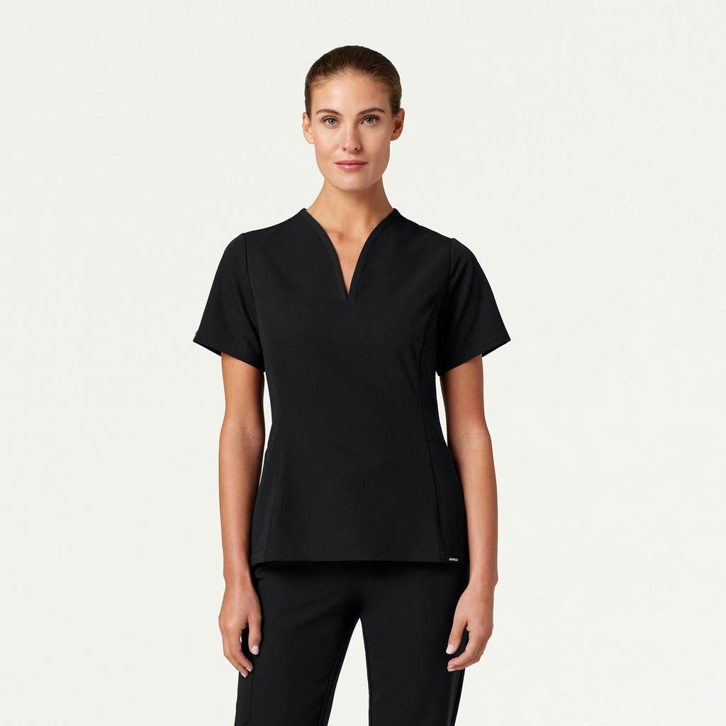 Jaanuu 2-pocket Tailored V-neck Scrub Top In Black