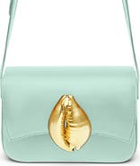 Flore K. Sì Cowrie Shell
