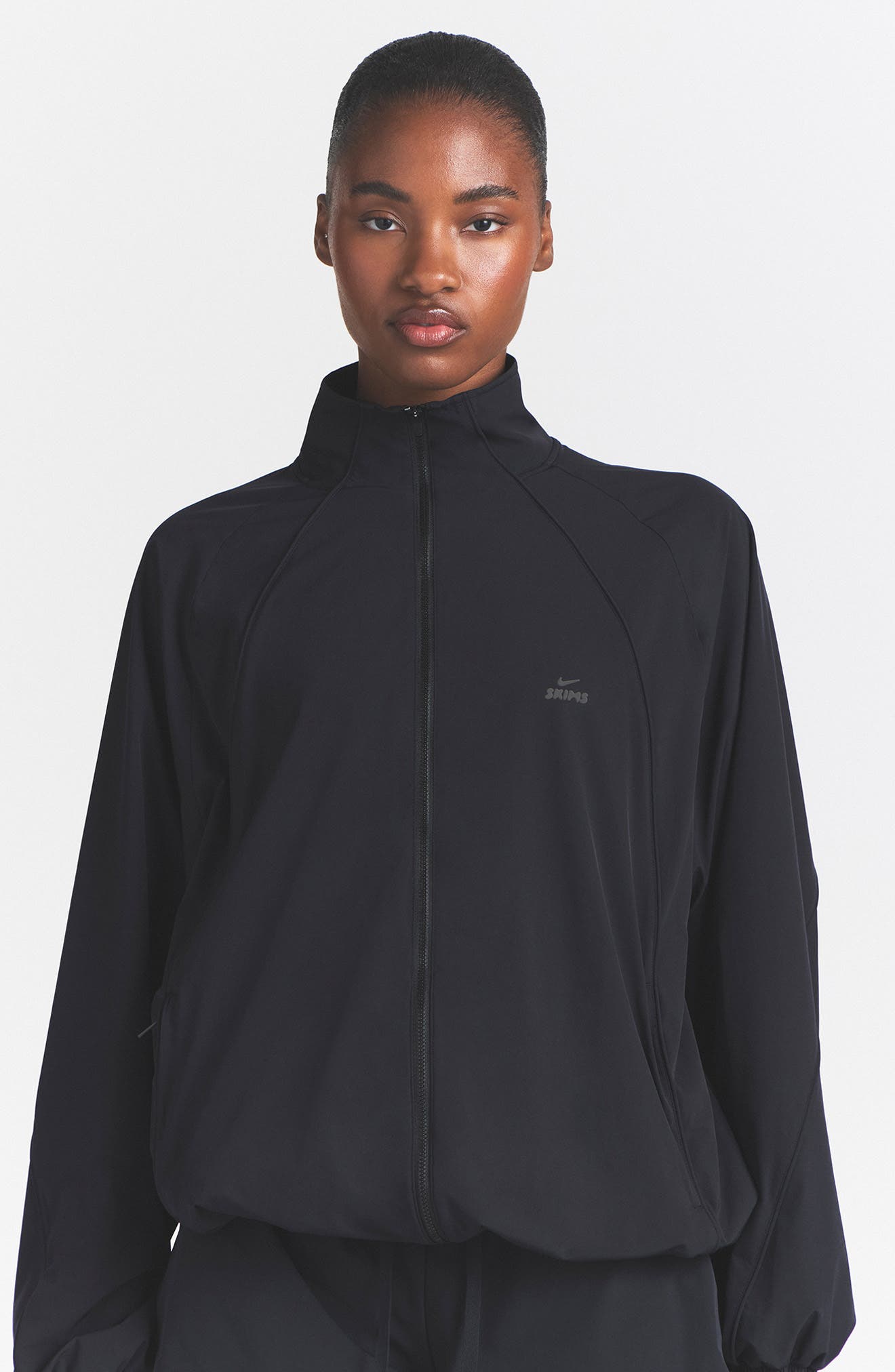 NikeSKIMS Oversize Stretch Nylon Track Jacket (Women) | Nordstrom