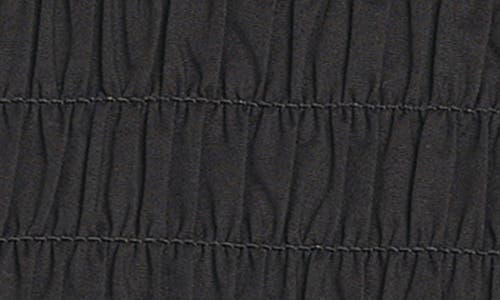 Wayf Matilda Smocked Peplum Top In Black
