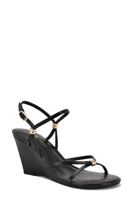Nine West <p>Deklyn Faux Leather Wedge Sandal (Women)</p>