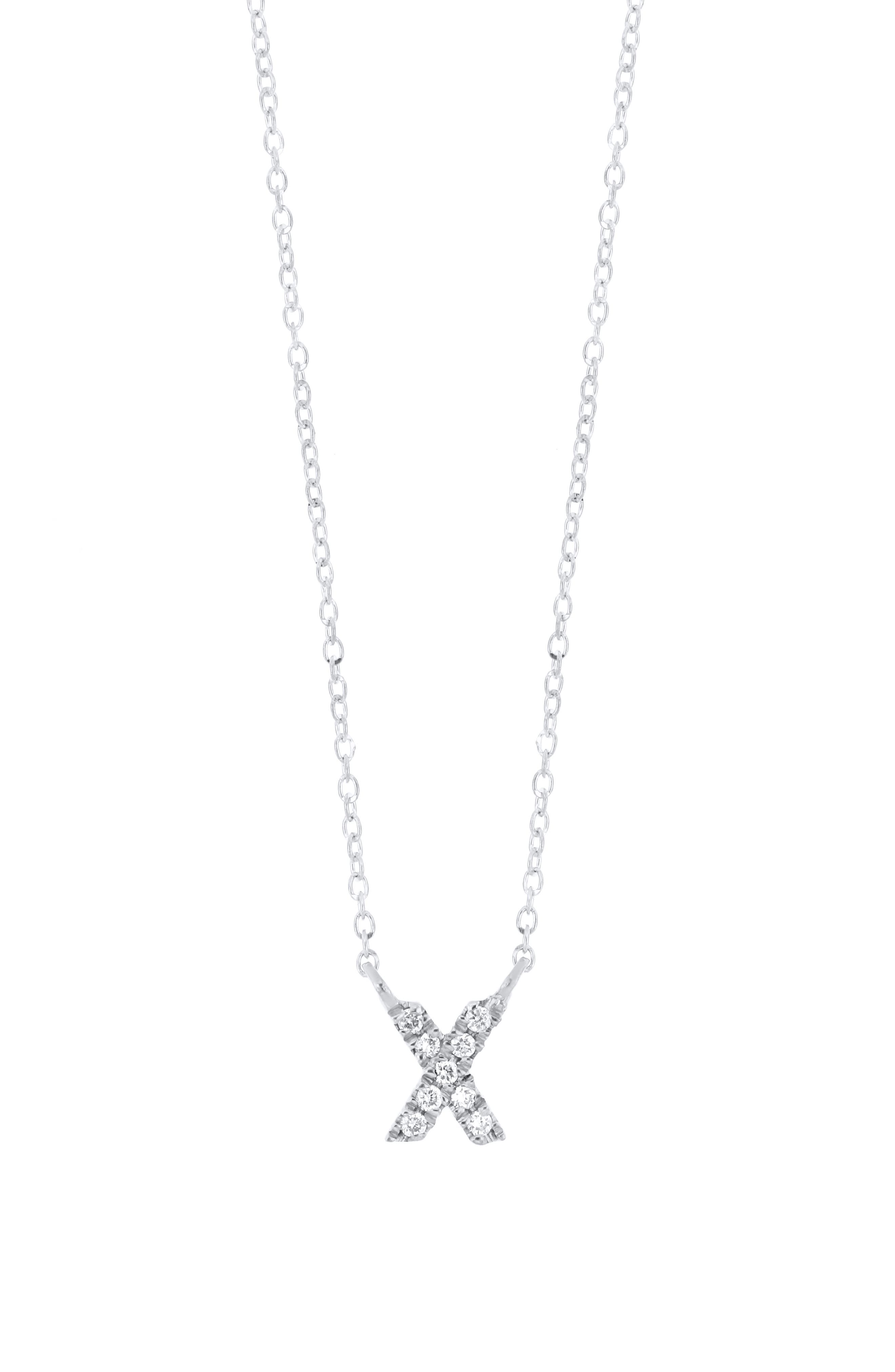 18K WHITE GOLD - X