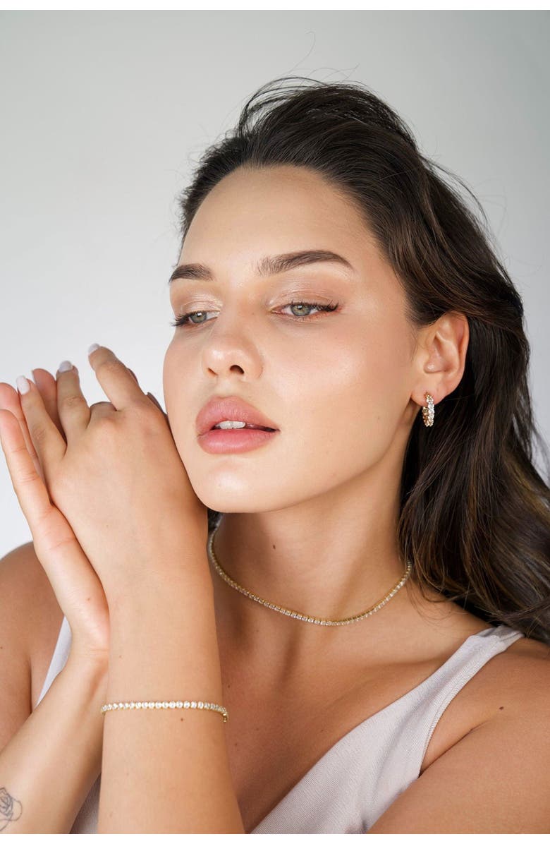 Hollywood Sensation Radiant Glamour Huggie Hoop Earrings Embellished with Sparkling Cubic Zirconia, Alternate, color, Gold