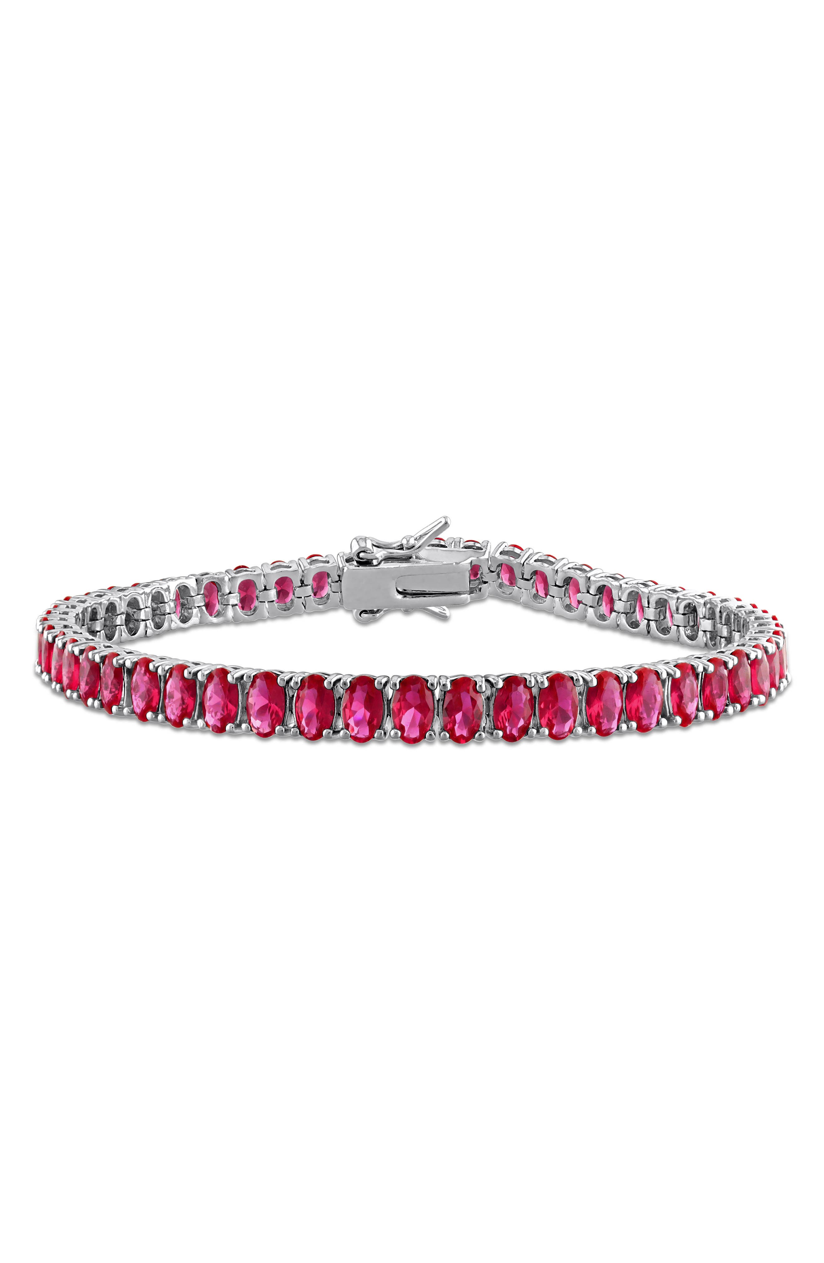 DELMAR Oval Cut Created Ruby Tennis Bracelet