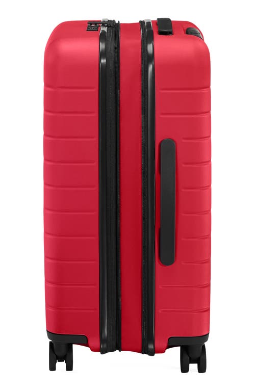 Away The Bigger Carry-on Flex Suitcase In Red