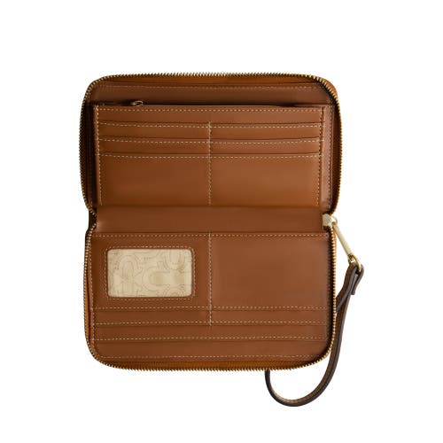 True Religion Buddha Patch Zip Around Wristlet In Blue