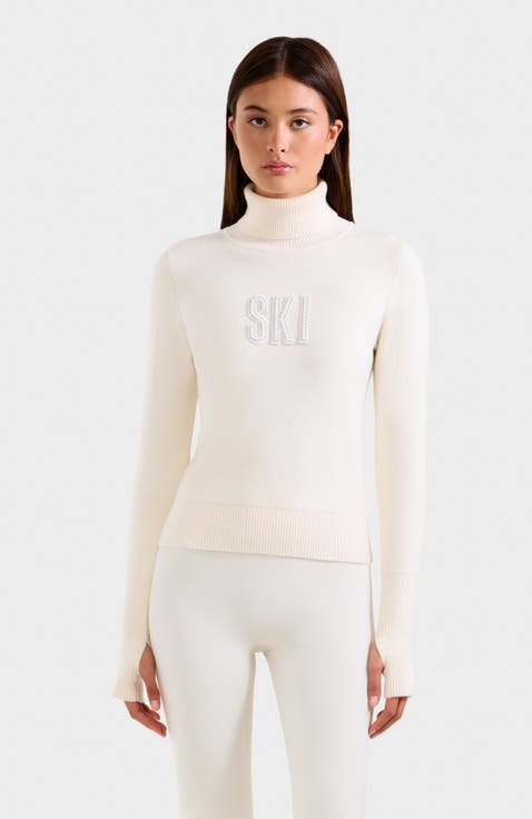 Novie Knit Embellished Ski Logo Turtleneck Sweater