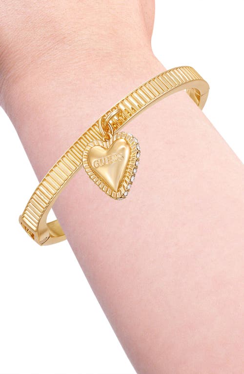 Guess Gold-tone Heart Charm Bangle Bracelet In Gold