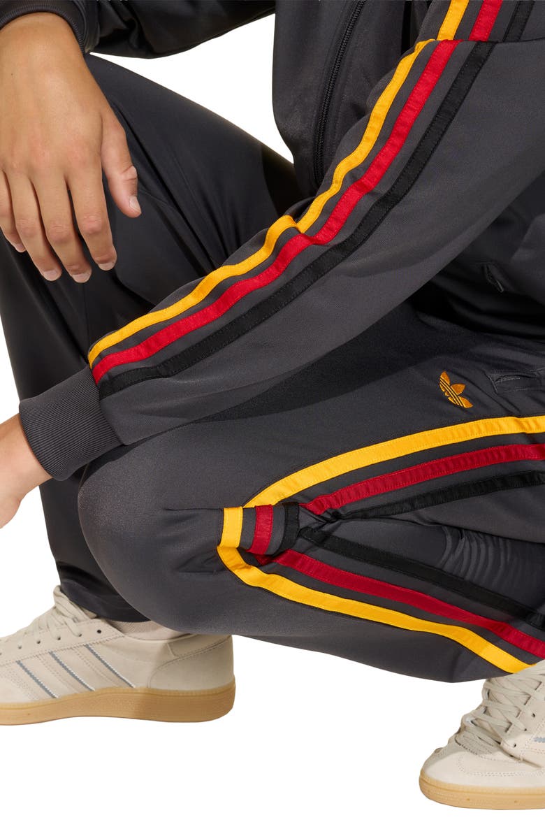 adidas Originals Kids' Firebird Recycled Polyester Track Pants, Alternate, color, Utility Black/ Collegiate Gold