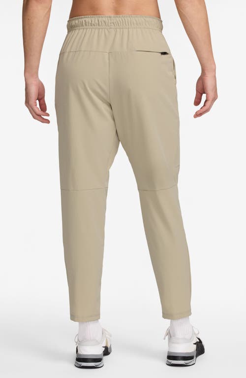 Nike Dri-fit Unlimited Drawstring Pants In Brown