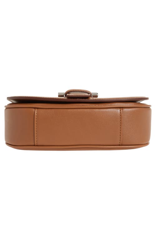 Alexander Mcqueen Mini T Bar Leather Saddle Crossbody Bag In Tan Silver
