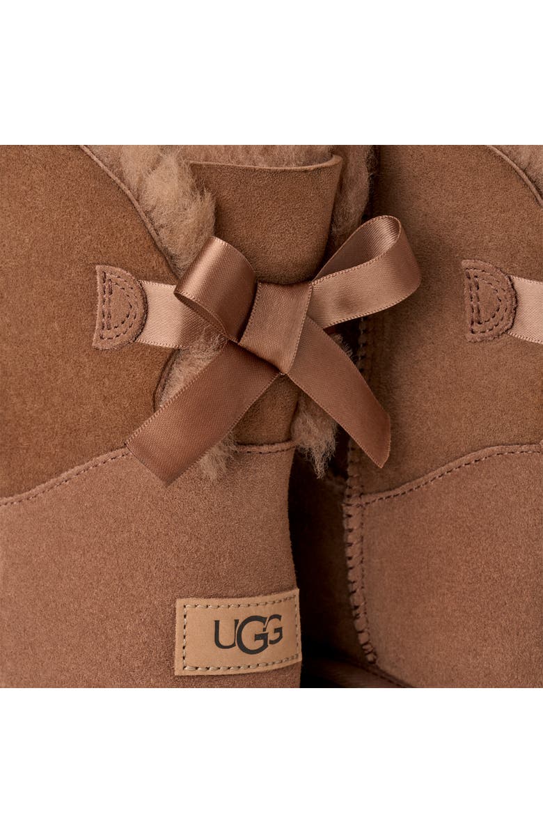 UGG<sup>®</sup> Mini Bailey Bow II Genuine Shearling Bootie, Alternate, color, Rocky Oak