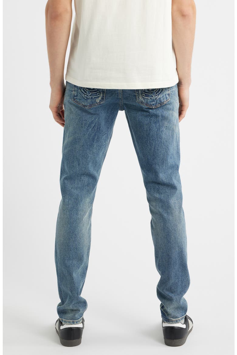 Trek Slim Fit Distressed Jeans, Alternate, color, RACER