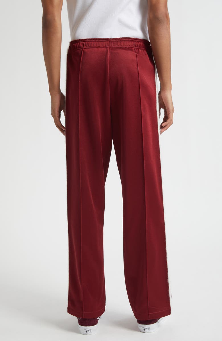 STOCKHOLM SURFBOARD CLUB Monogram Track Pants, Alternate, color, Cherry