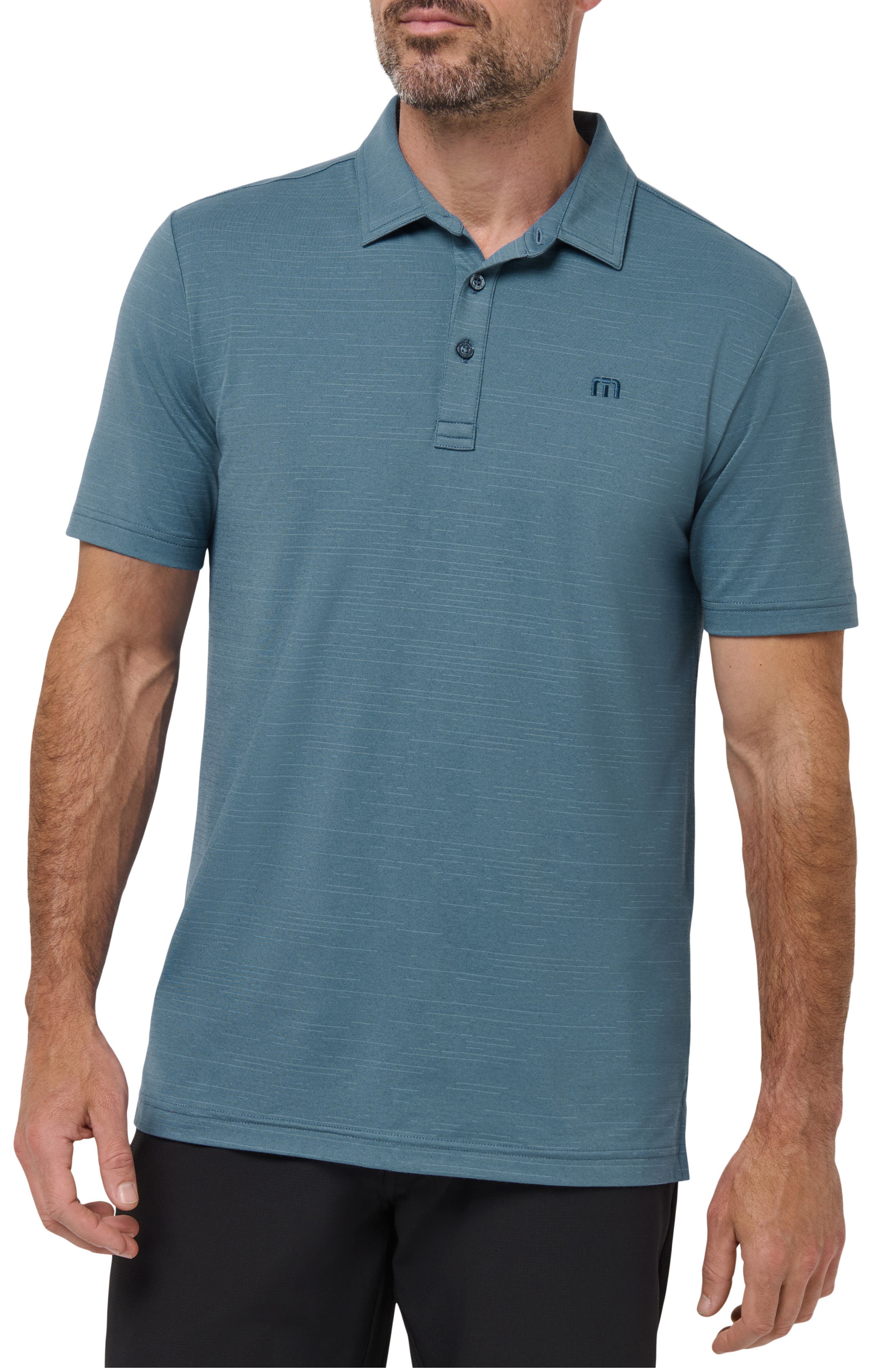 TravisMathew The Heater Solid Short Sleeve Performance Polo
