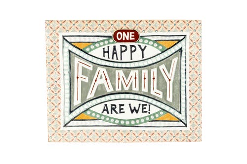 Storied Home 18.25"W Embossed "One Happy Family Are We!" Enameled Metal Wall Décor in Multicolor  product
