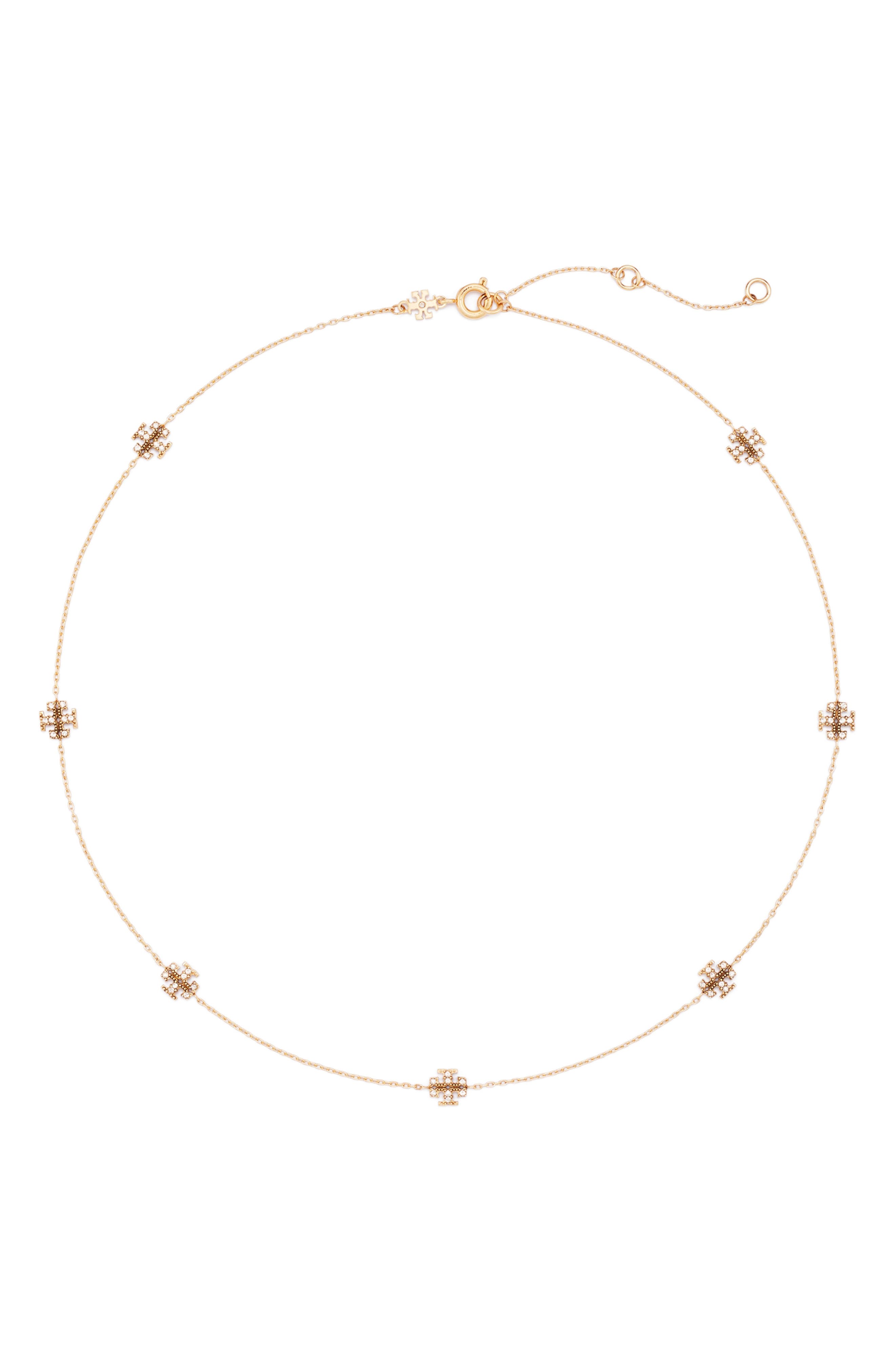 selected TORY GOLD / CRYSTAL