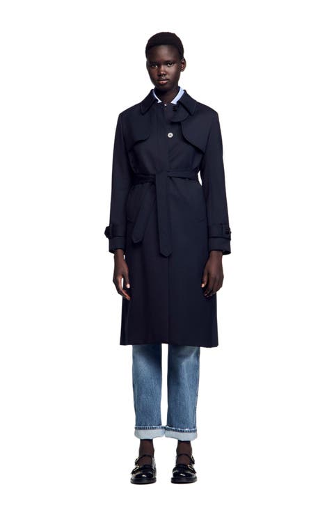 Trench coat with pleated inset