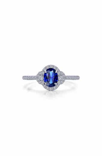 Oval Lab Grown Sapphire & Simulated Diamond Halo Ring