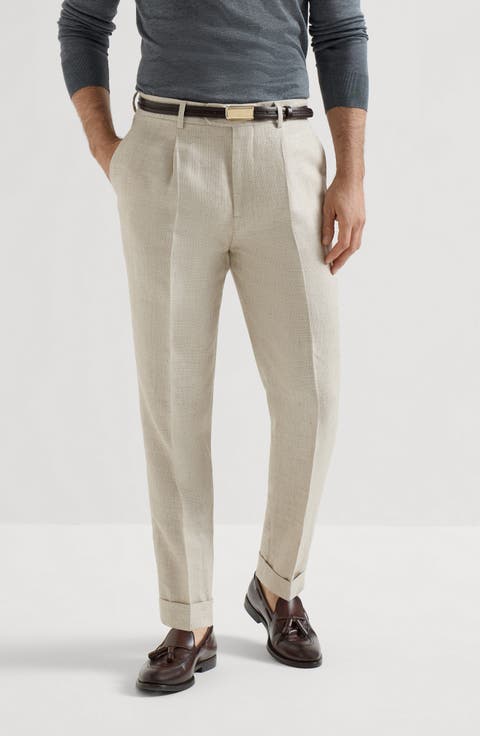 Trousers with pleats