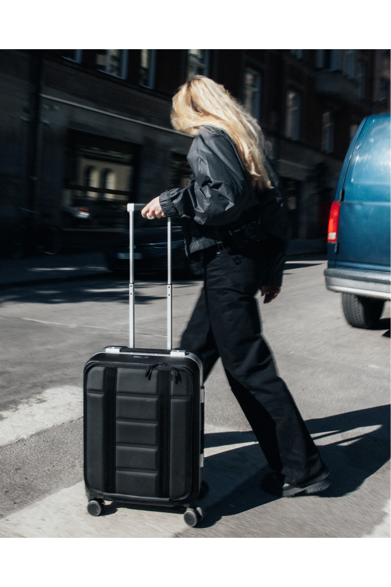 Ramverk Pro Hardside 21 Inch Carry On Luggage Spinner with Buckle Closure and Zipper Front Access Pocket, Alternate, color, Silver
