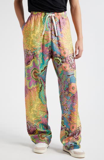 パンツ PALM ANGELS  PRINT PANTS IN TECHNICAL FABRIC Palm Angels cheetah-print Track Pants | Orange | FARFETCH